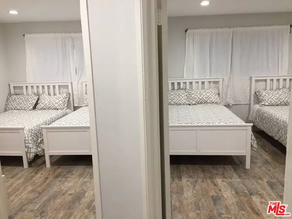 a room with a bed and a chair