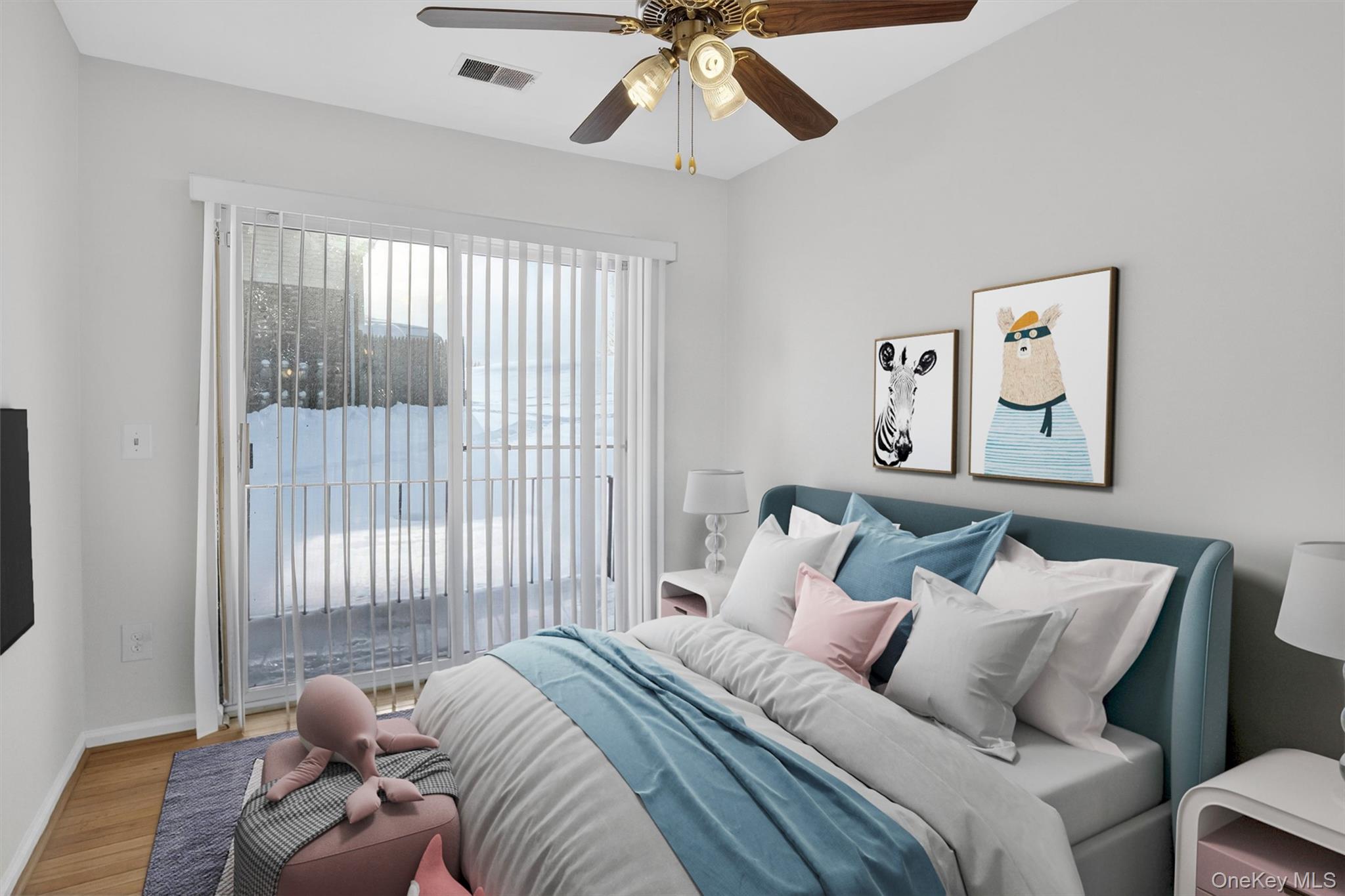 276 Temple Hill Road, Unit 2203 New Windsor, NY 12553 - Photo 13 of 23 Bright bedroom with ceiling fan and sliding glass doors providing natural light.