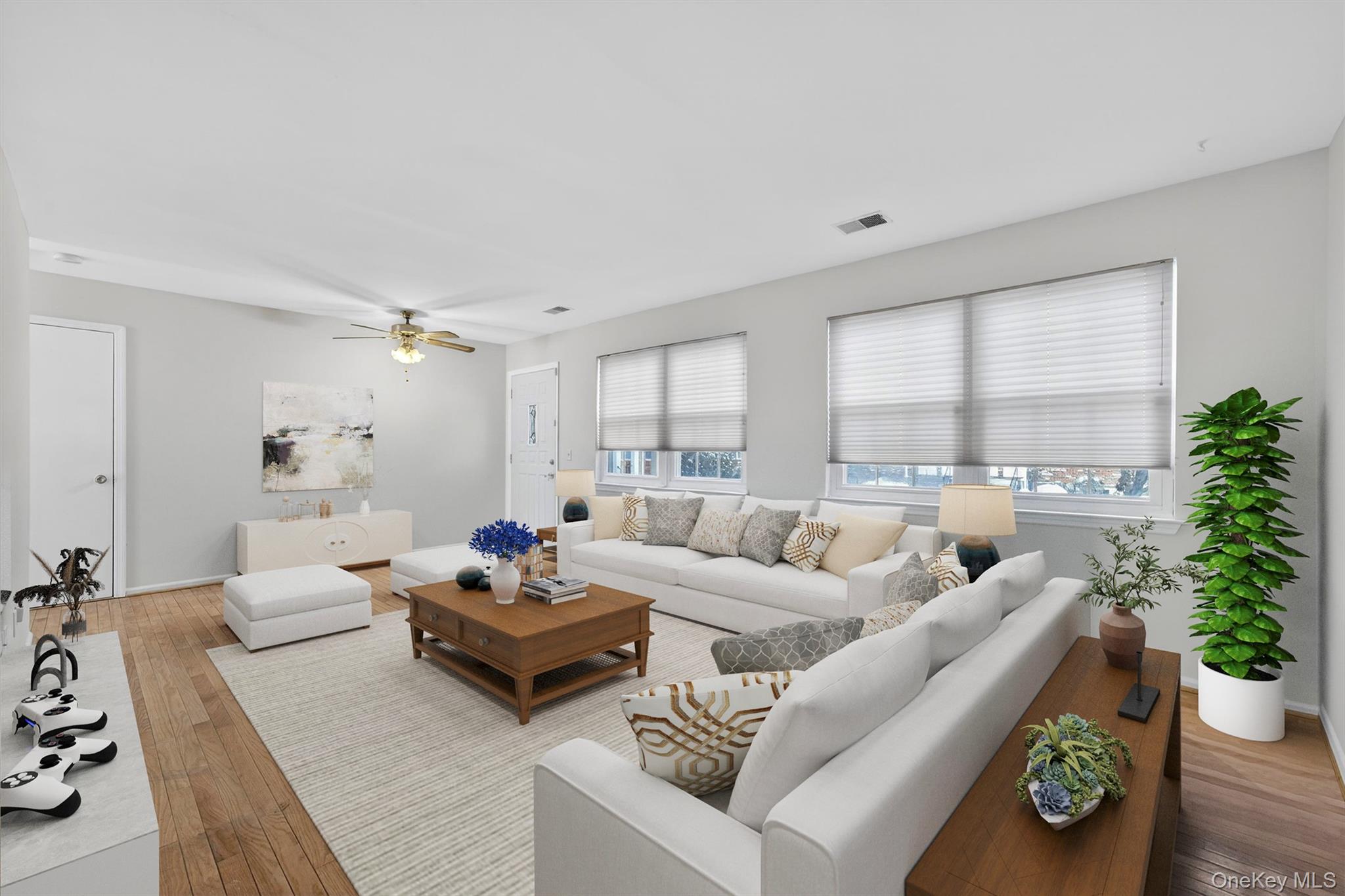 276 Temple Hill Road, Unit 2203 New Windsor, NY 12553 - Photo 6 of 23 Well-proportioned living room with hardwood flooring and a bright, airy feel.