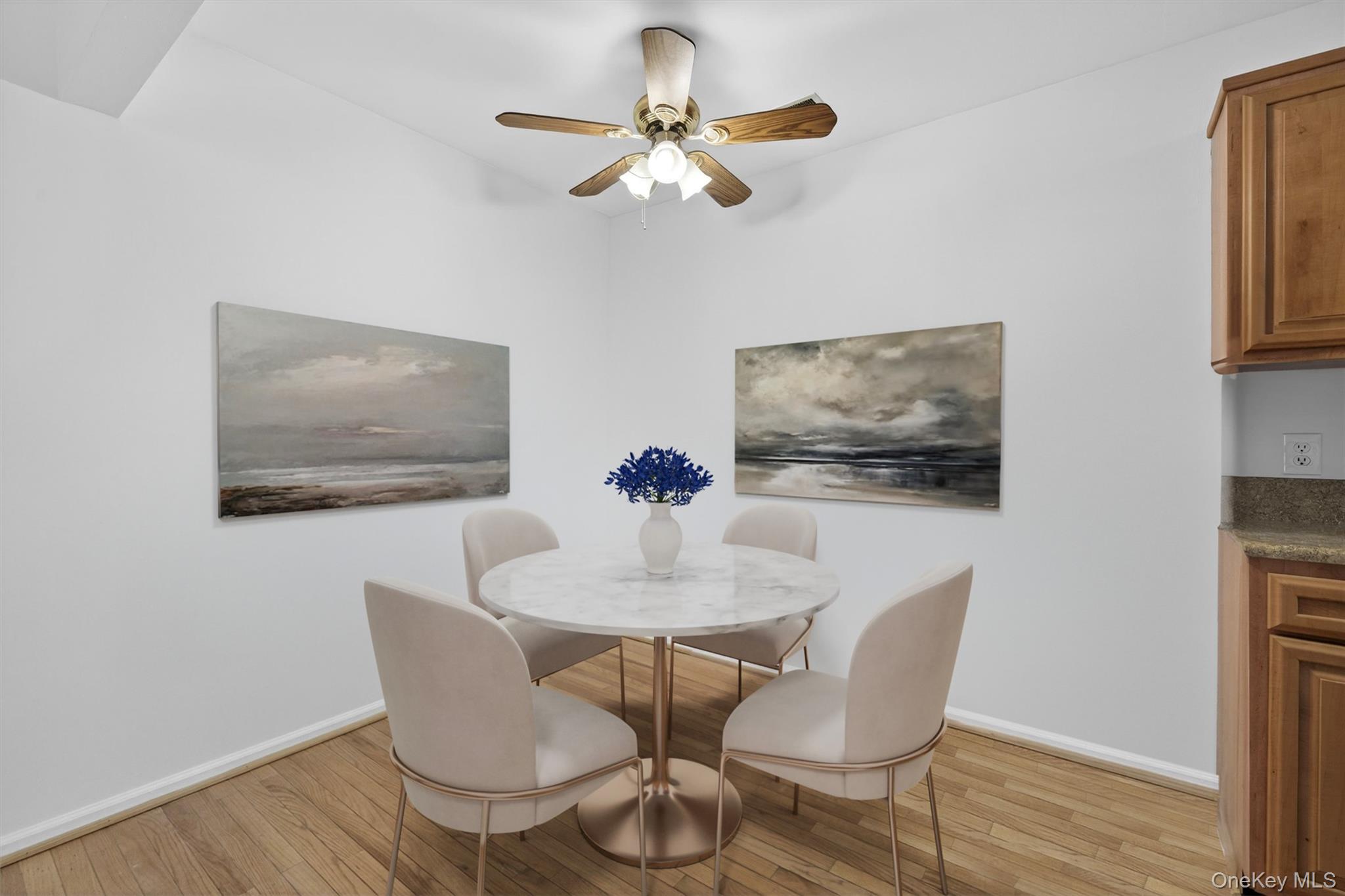 276 Temple Hill Road, Unit 2203 New Windsor, NY 12553 - Photo 9 of 23 Dedicated dining area with hardwood floors, ceiling fan, and comfortable seating space.