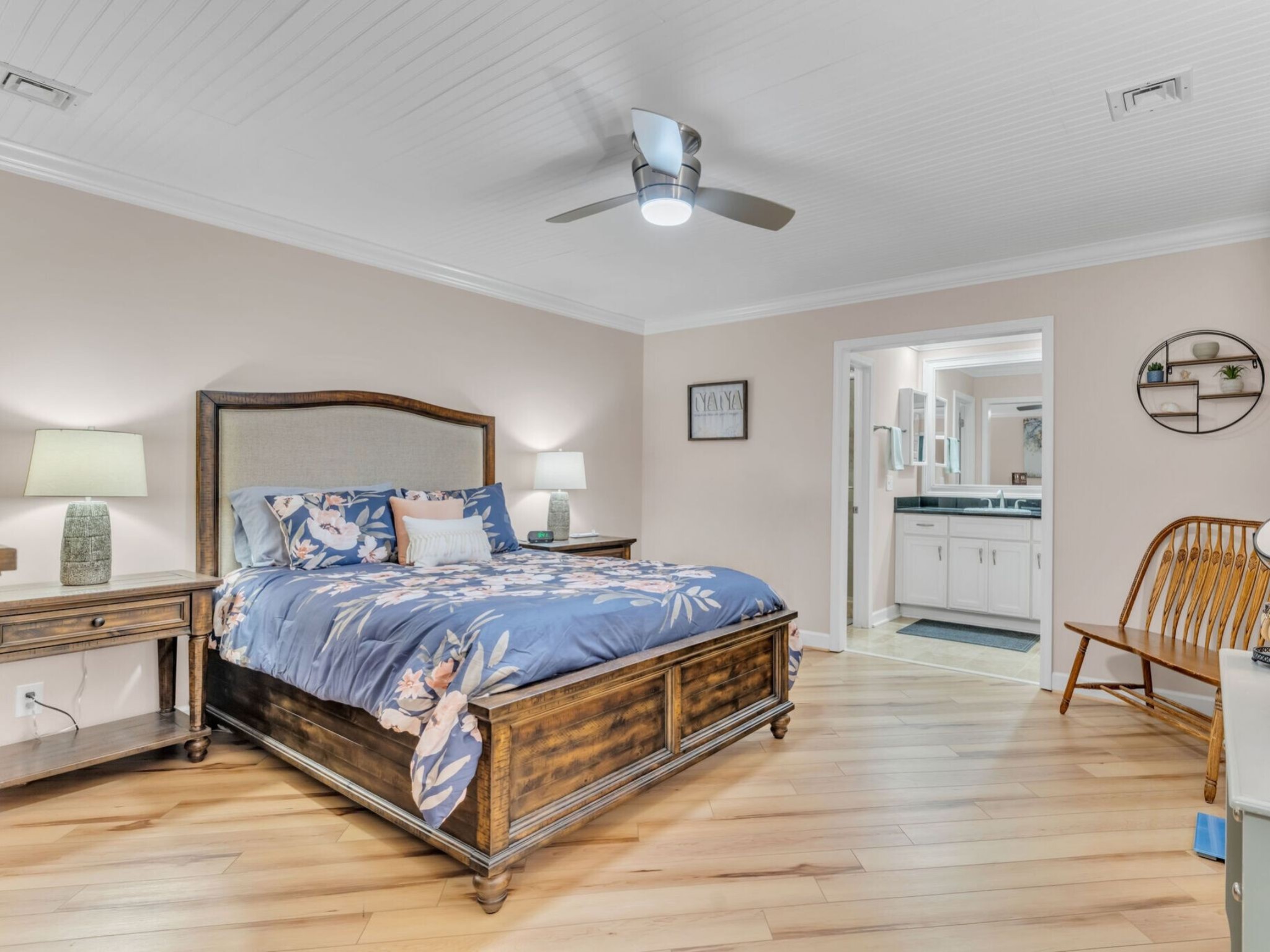 1035 General George Patton Road Nashville, TN 37221 - Photo 15 of 32 a spacious bedroom with a bed and a lamp on table