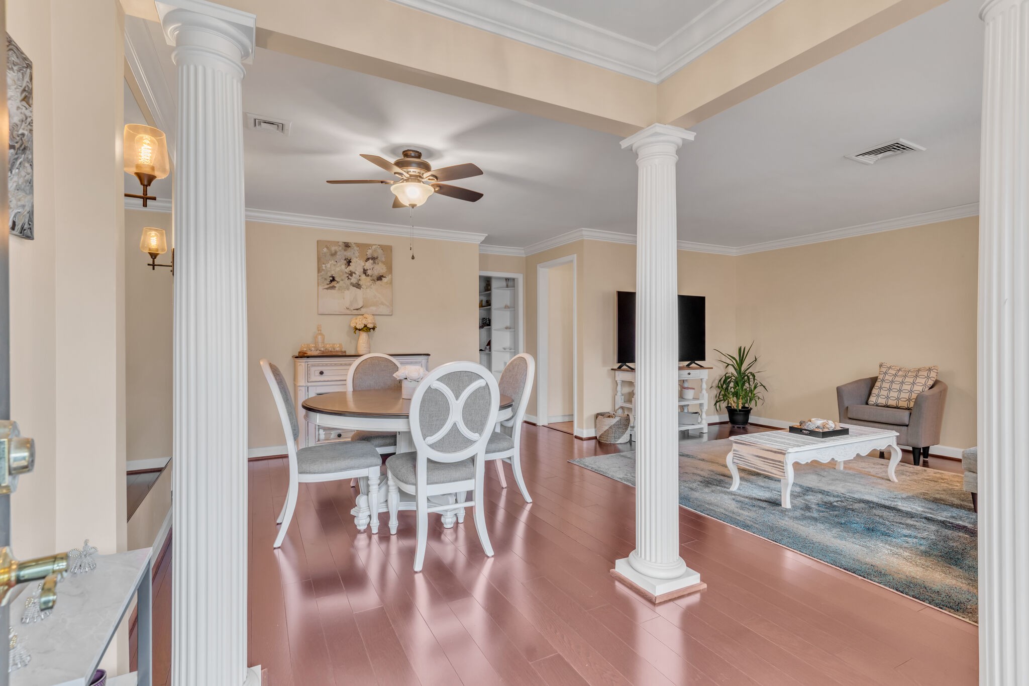 1035 General George Patton Road Nashville, TN 37221 - Photo 3 of 32 a view of a dining room with furniture a chandelier and wooden floor