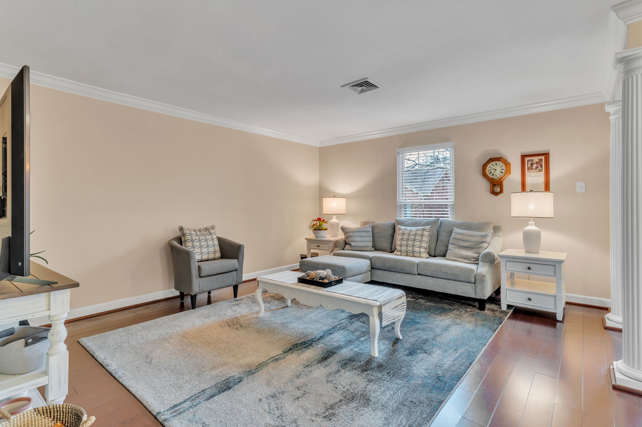 1035 General George Patton Road Nashville, TN 37221 - Photo 5 of 32 a living room with furniture and a flat screen tv