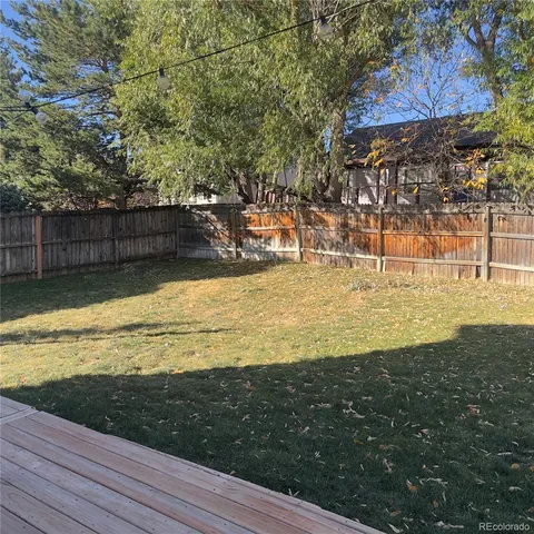 a view of a swimming pool with an outdoor space