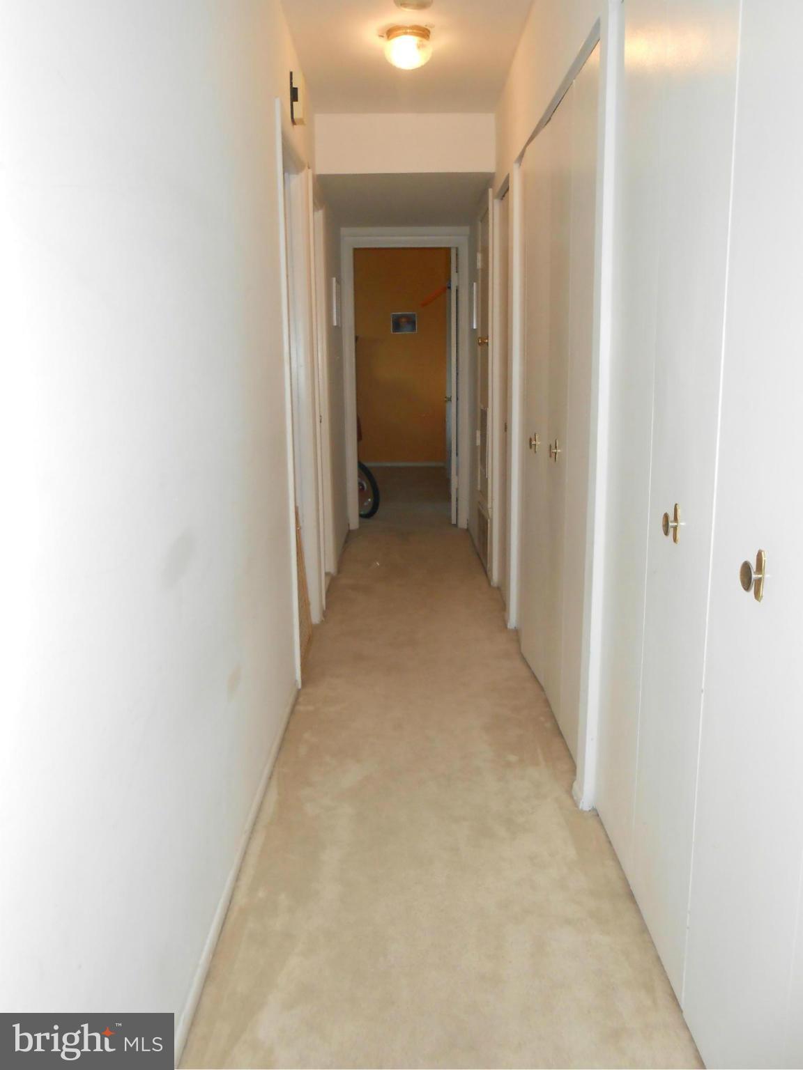 11917 Tarragon Road, Unit I Reisterstown, MD 21136 - Photo 8 of 9 a view of a hallway with a white walls