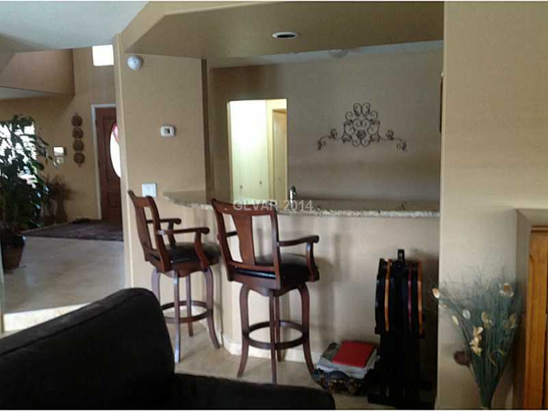 725 Rising Star Drive Henderson, NV 89014 - Photo 7 of 19 Property Photo. Wet bar in Family Room