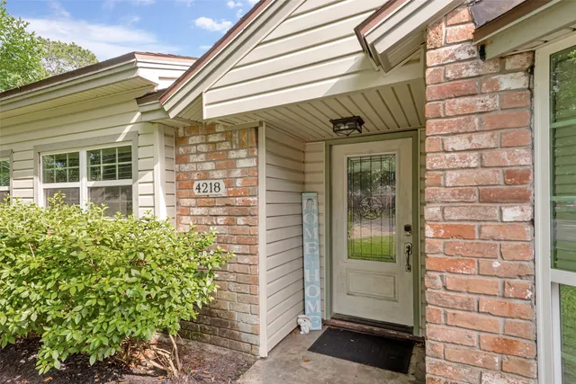 a front view of a house with a glass door