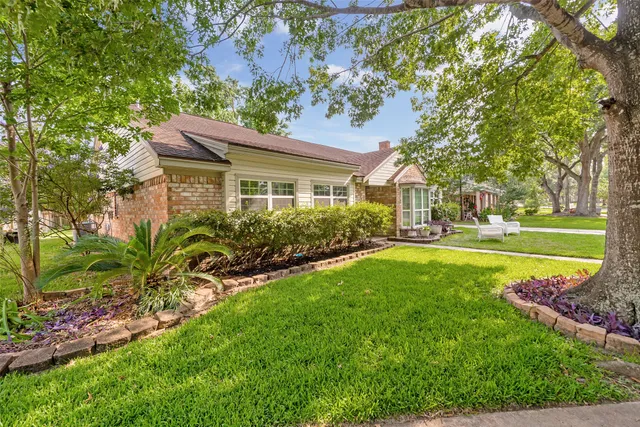 a house view with a garden space