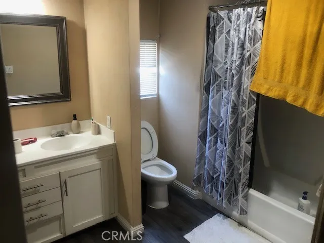 16600 Downey, Unit 115 Paramount, CA 90723 - Photo 7 of 15 a bathroom with a sink toilet and shower
