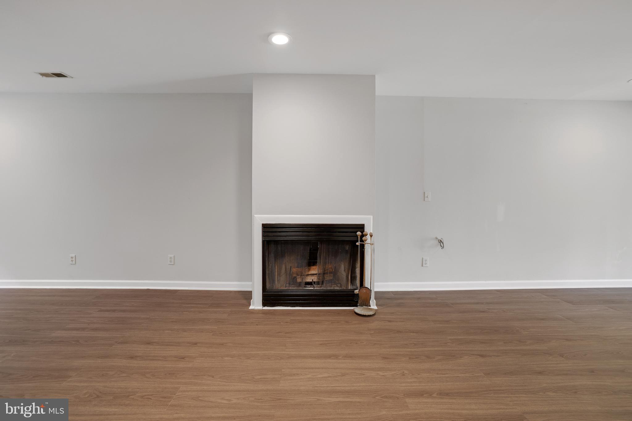358 Hall Road Crownsville, MD 21032 - Photo 24 of 41 Fireplace in Lower Level Family Room