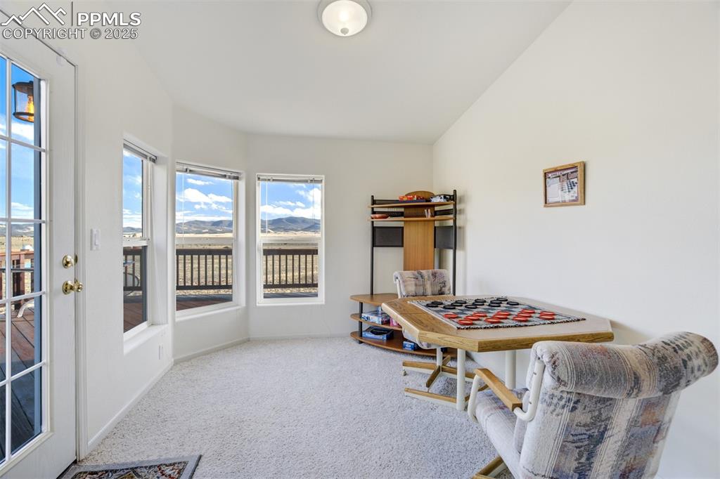 688 Tiara Road Lake George, CO 80827 - Photo 12 of 46 a living room with furniture and a window