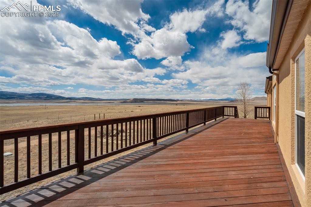 688 Tiara Road Lake George, CO 80827 - Photo 24 of 46 a view of a balcony with wooden floor