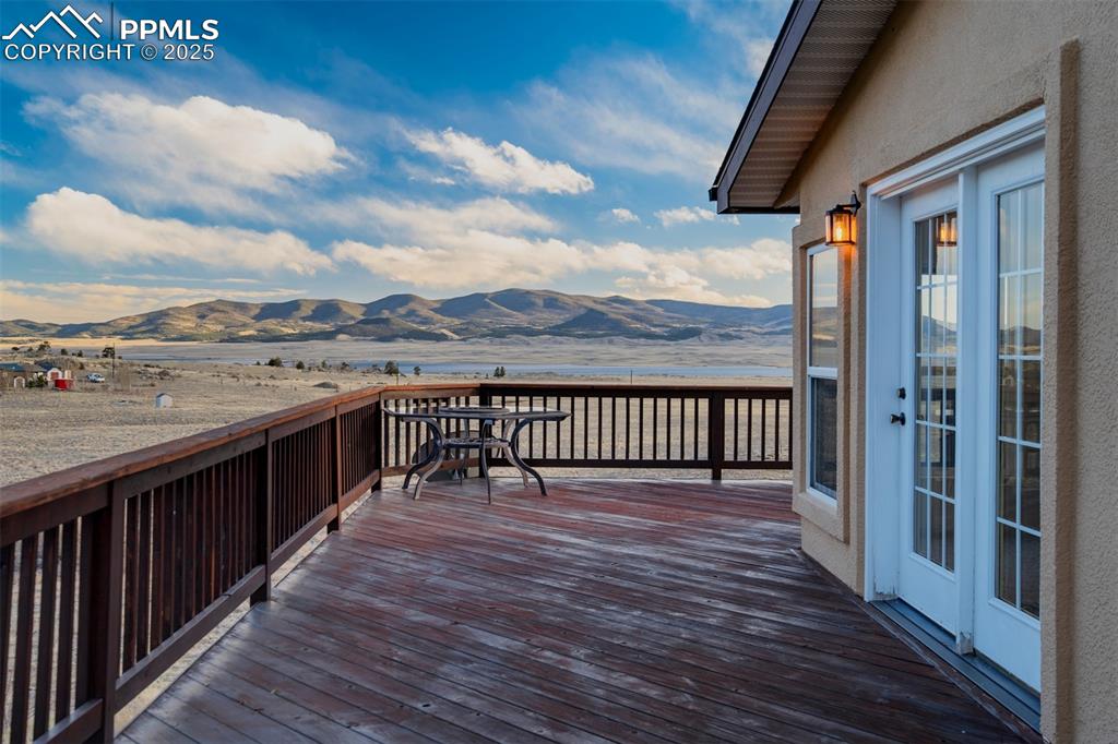 688 Tiara Road Lake George, CO 80827 - Photo 26 of 46 a view of a balcony with wooden floor