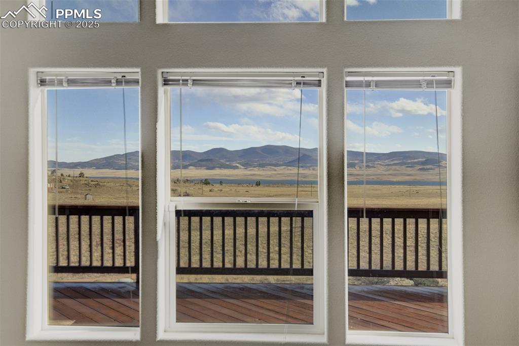 688 Tiara Road Lake George, CO 80827 - Photo 3 of 46 a view of a balcony from a window