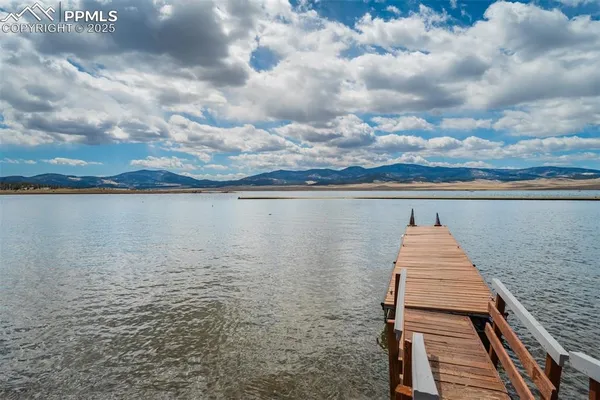 a view of a lake with a mountain in the background