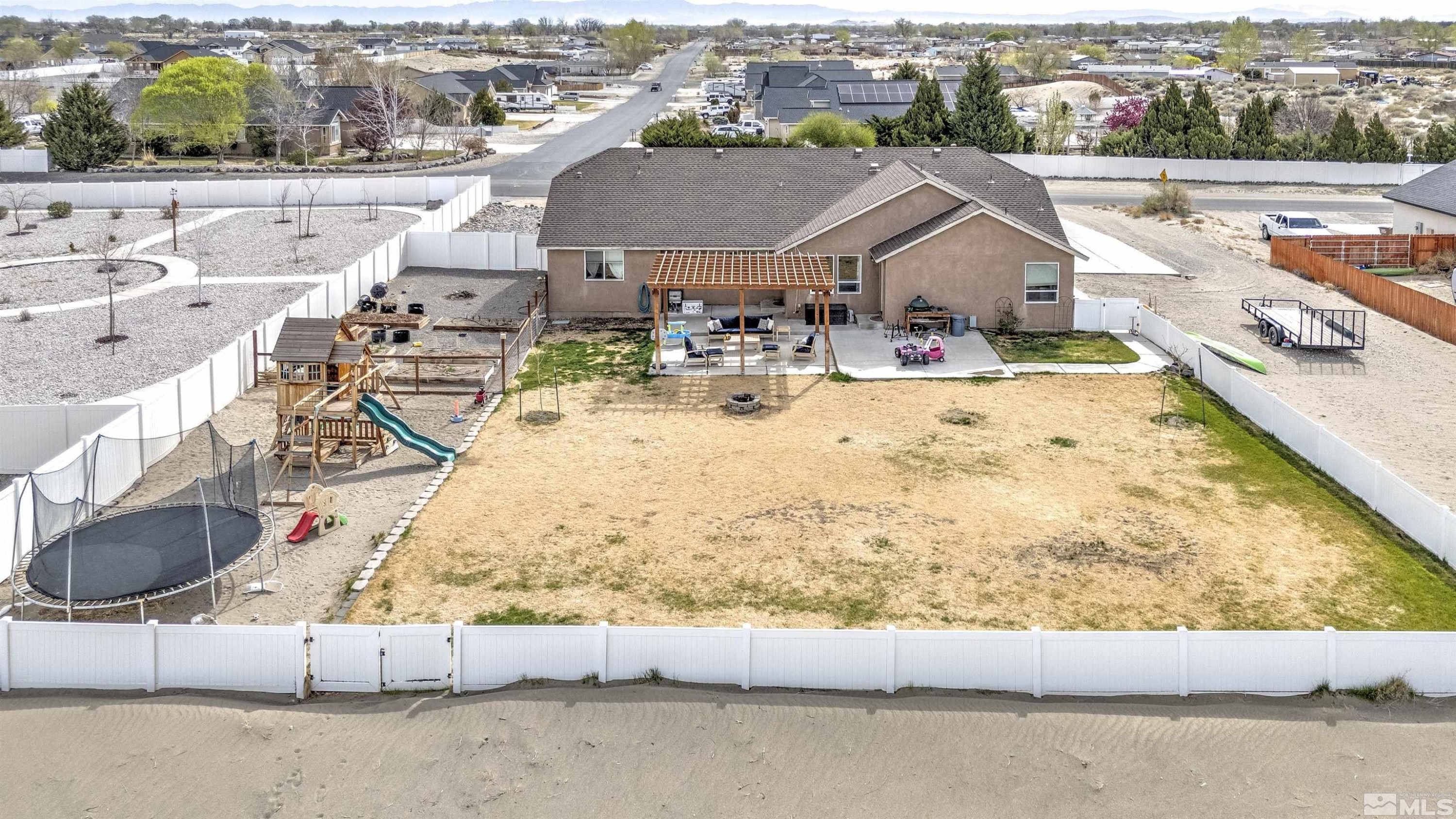 1675 Sky Ridge Drive Fallon, NV 89406 - Photo 28 of 31 an aerial view of a house with swimming pool