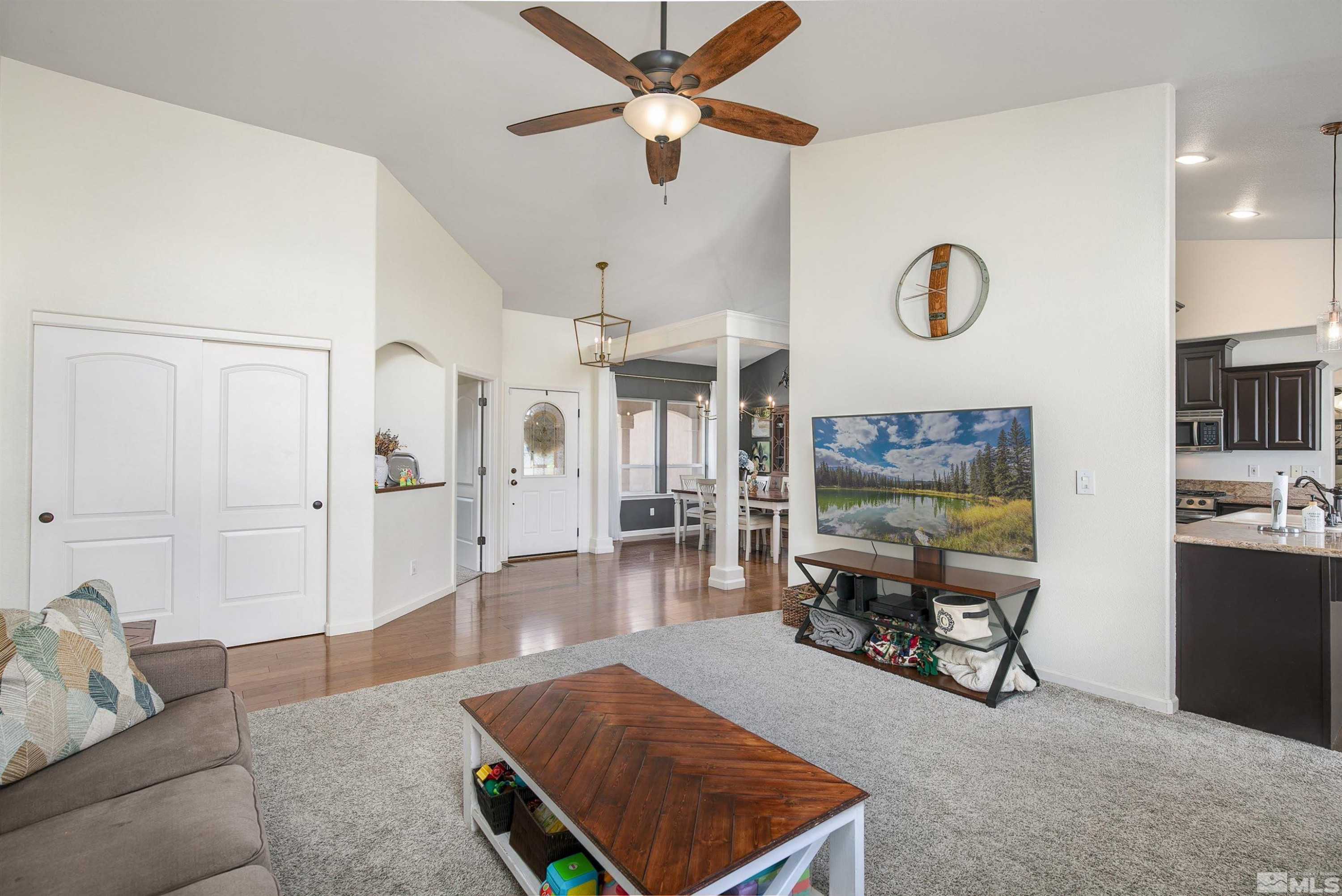 1675 Sky Ridge Drive Fallon, NV 89406 - Photo 5 of 31 a living room with furniture and a flat screen tv