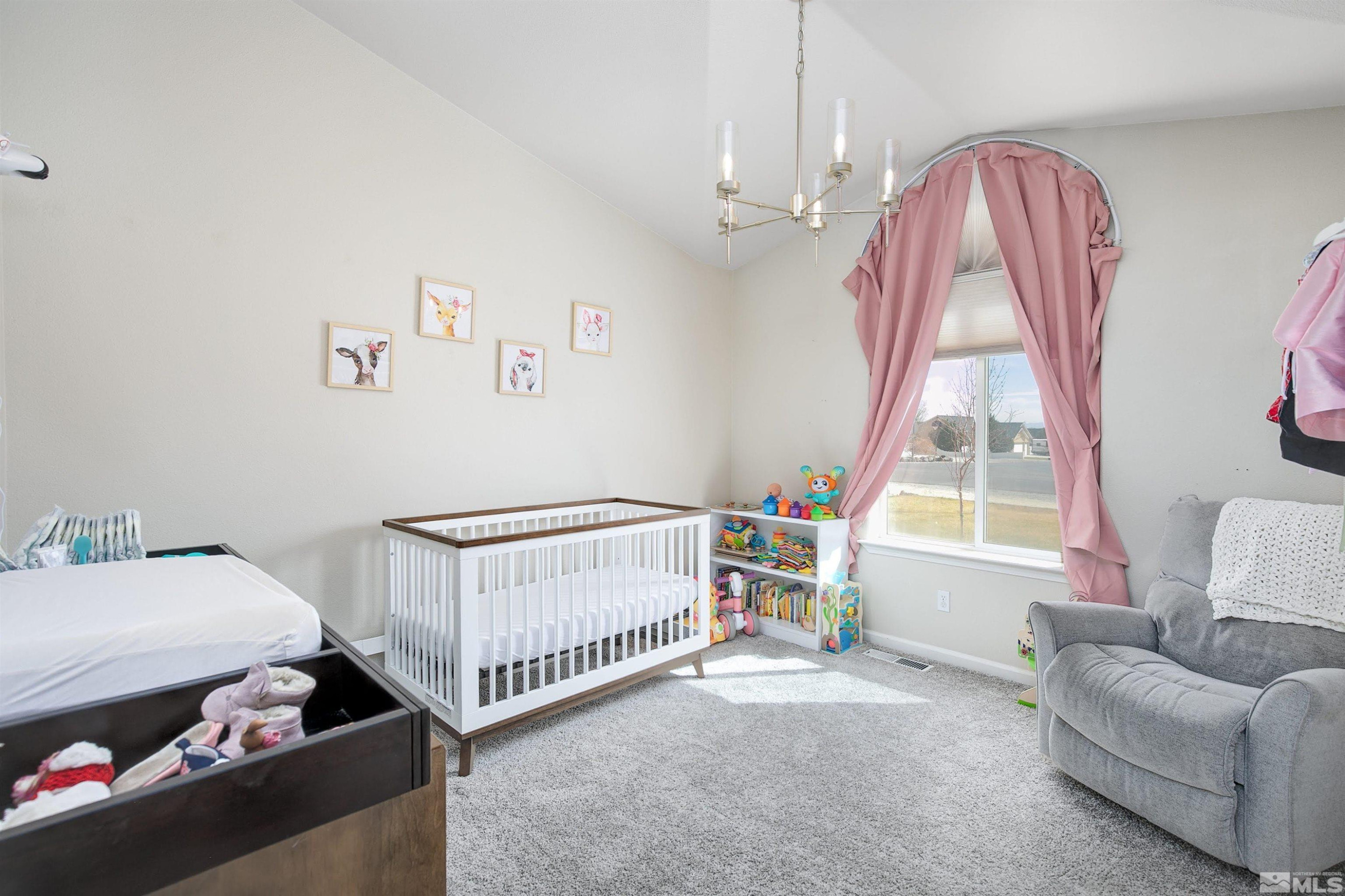 1675 Sky Ridge Drive Fallon, NV 89406 - Photo 10 of 31 a room with a bed and a window