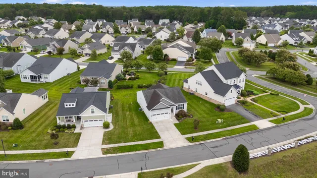aerial view of a house with outdoor space