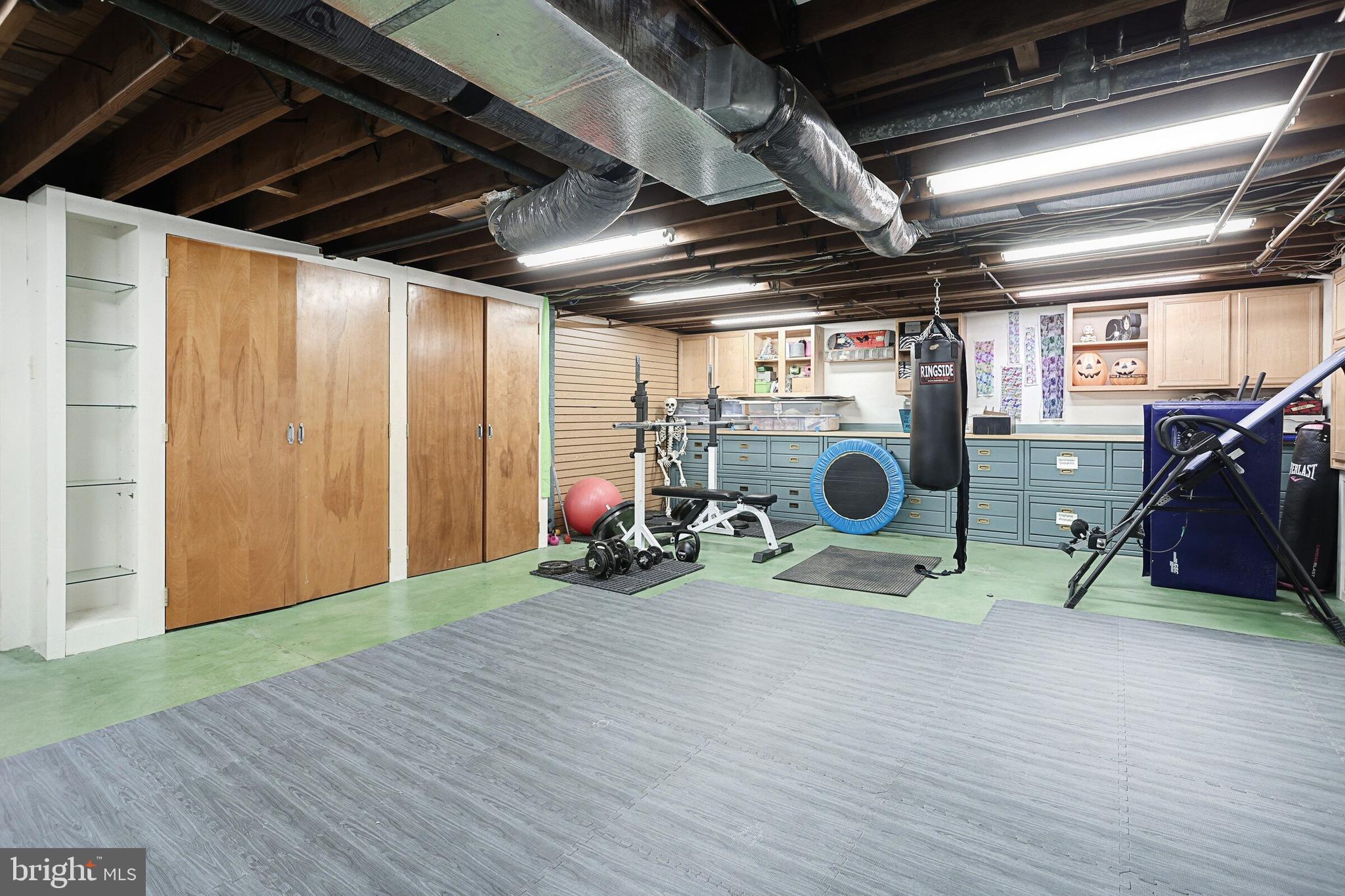 146 George Street Hanover, PA 17331 - Photo 70 of 83 Heated gym or hobby area with built in cabinetry