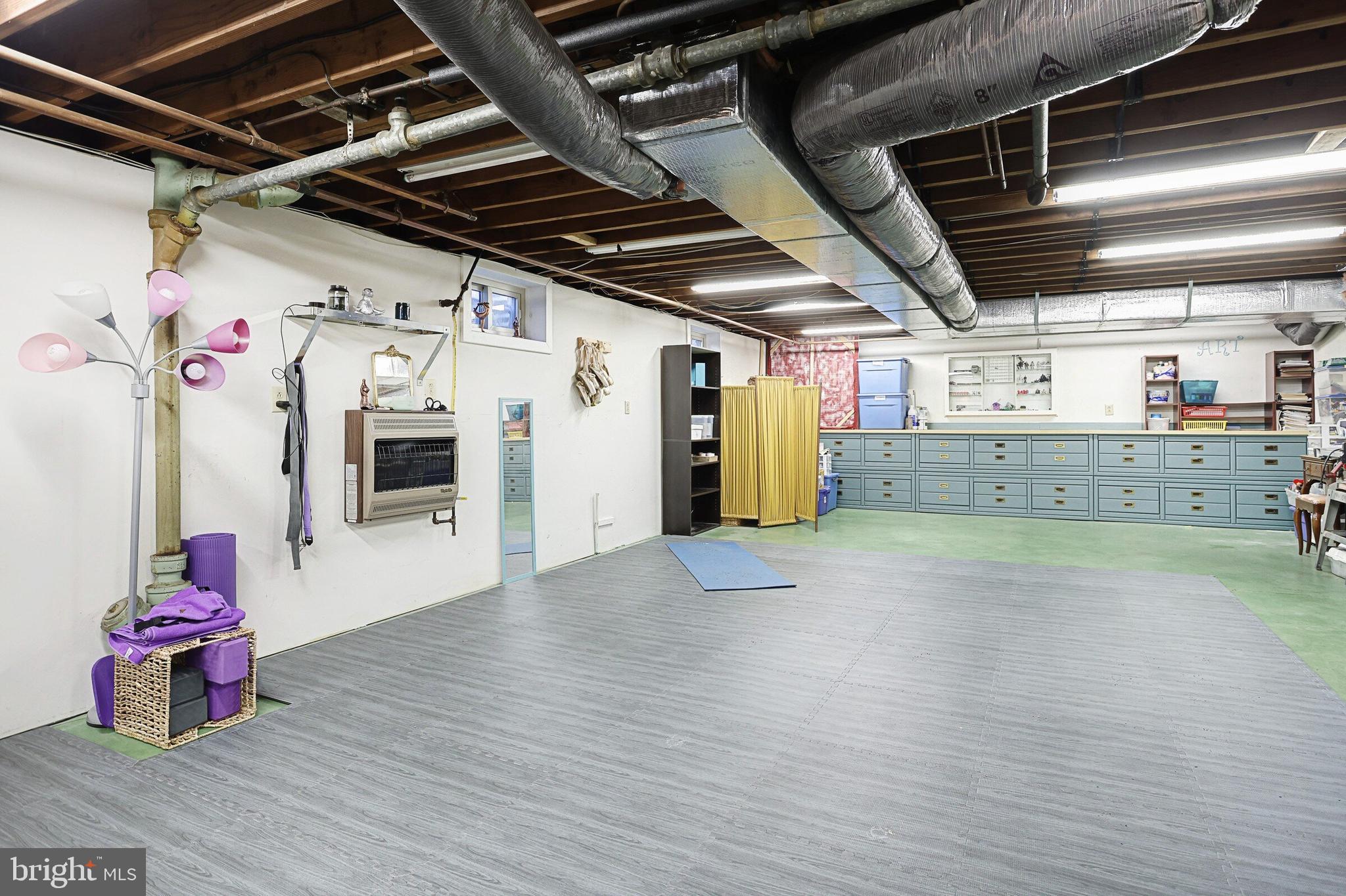 146 George Street Hanover, PA 17331 - Photo 71 of 83 Heated gym or hobby area with built in cabinetry