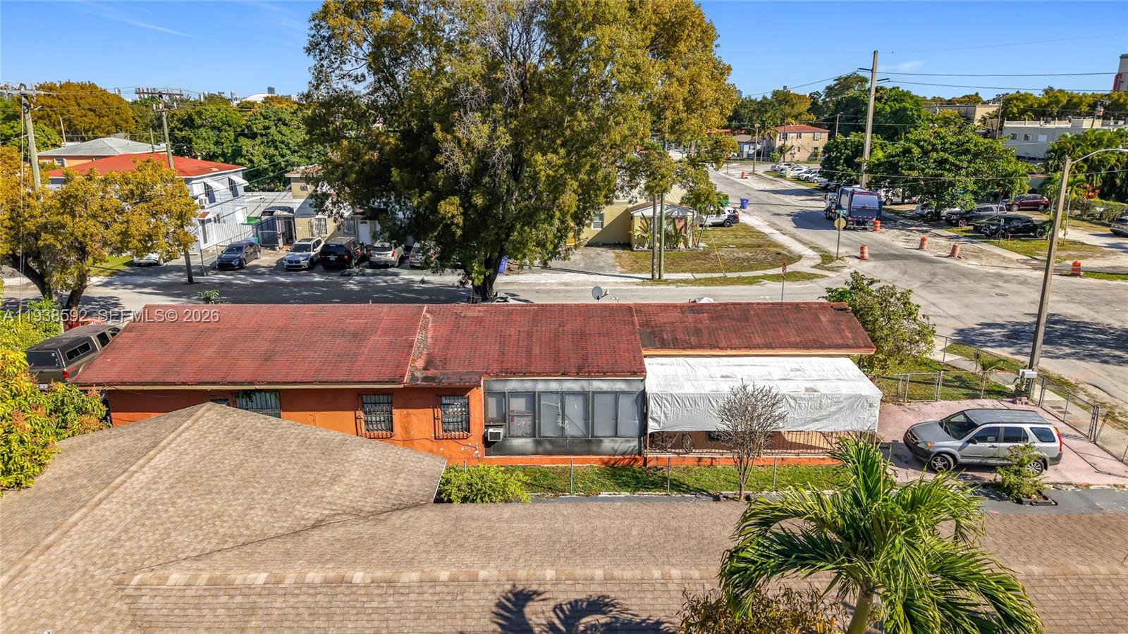 3601 Southwest 7th Street Miami, FL 33135 - Photo 3 of 20 a view of a swimming pool with a yard