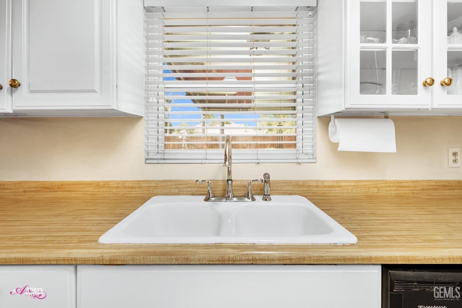 Undisclosed Address Bakersfield, CA 93309 - Photo 31 of 33 a bathroom with a sink and a window