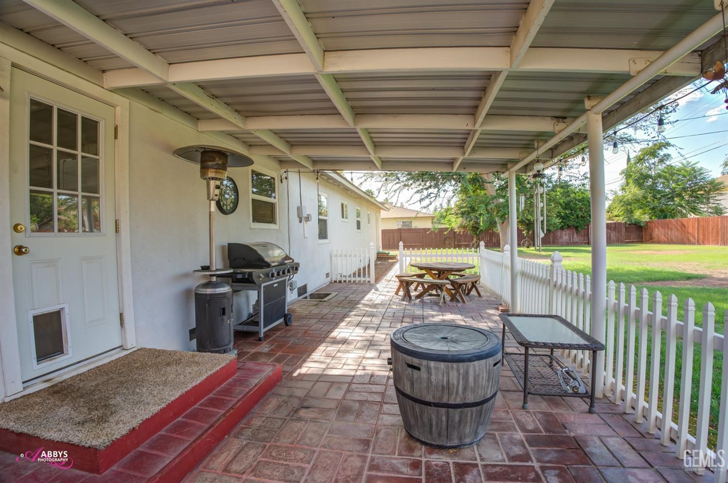 Undisclosed Address Bakersfield, CA 93309 - Photo 8 of 33 a view of a porch with furniture