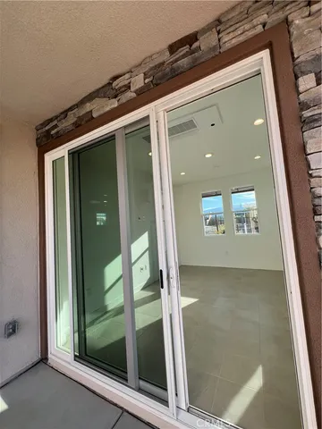 view of a hallway with wooden floor