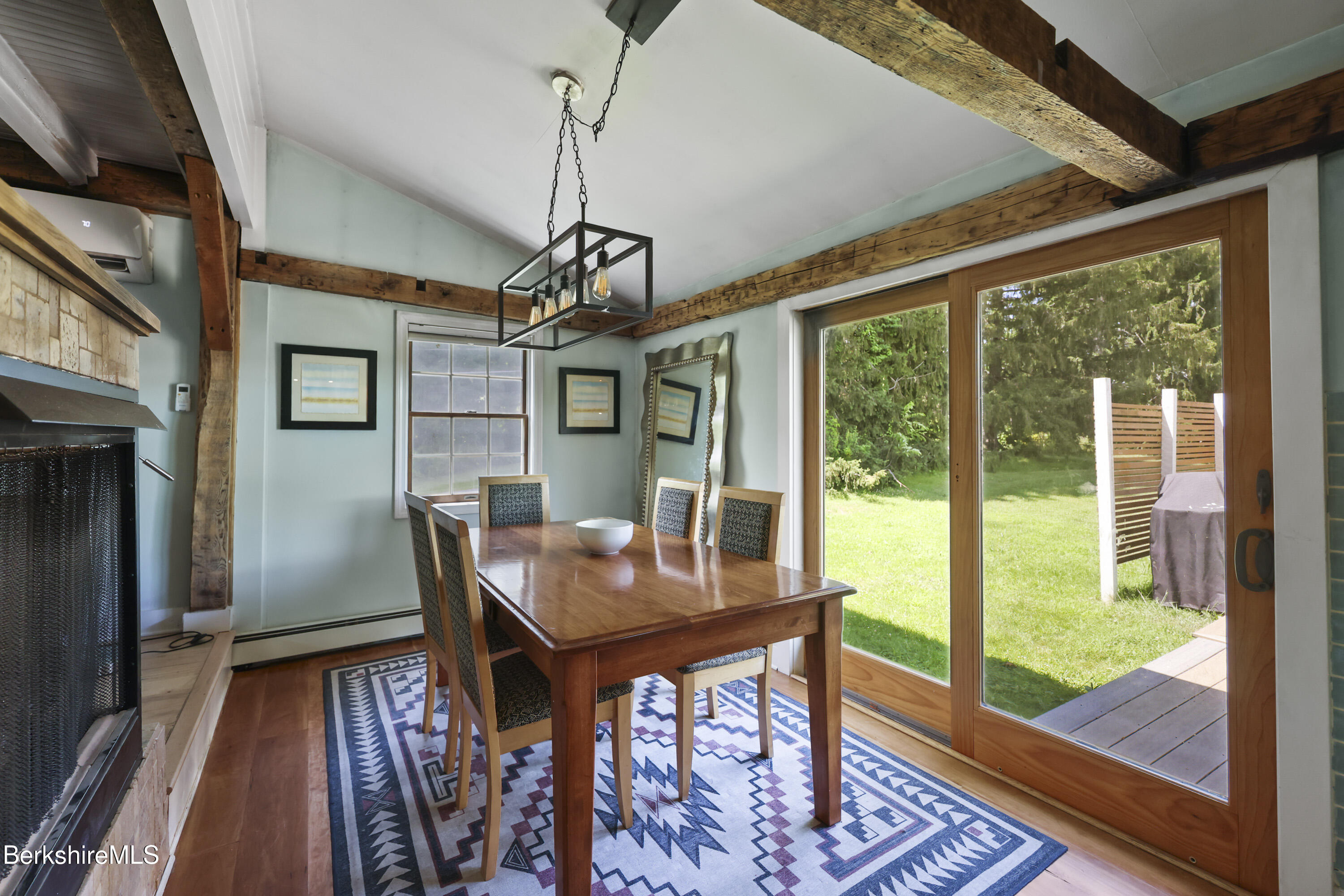 9 Castle Hill Road Stockbridge, MA 01262 - Photo 11 of 47 a view of a dining room with furniture window and wooden floor