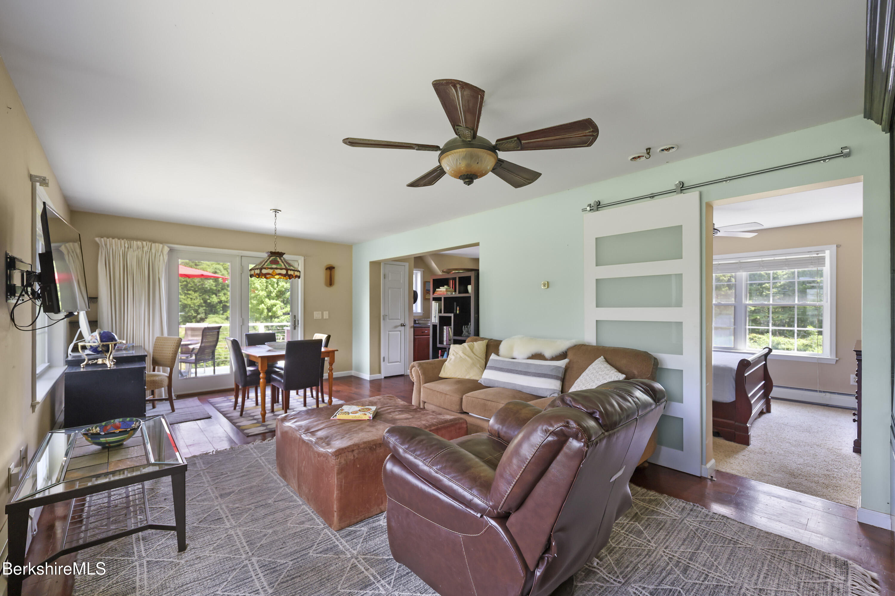 9 Castle Hill Road Stockbridge, MA 01262 - Photo 32 of 47 a living room with furniture ceiling fan and a window