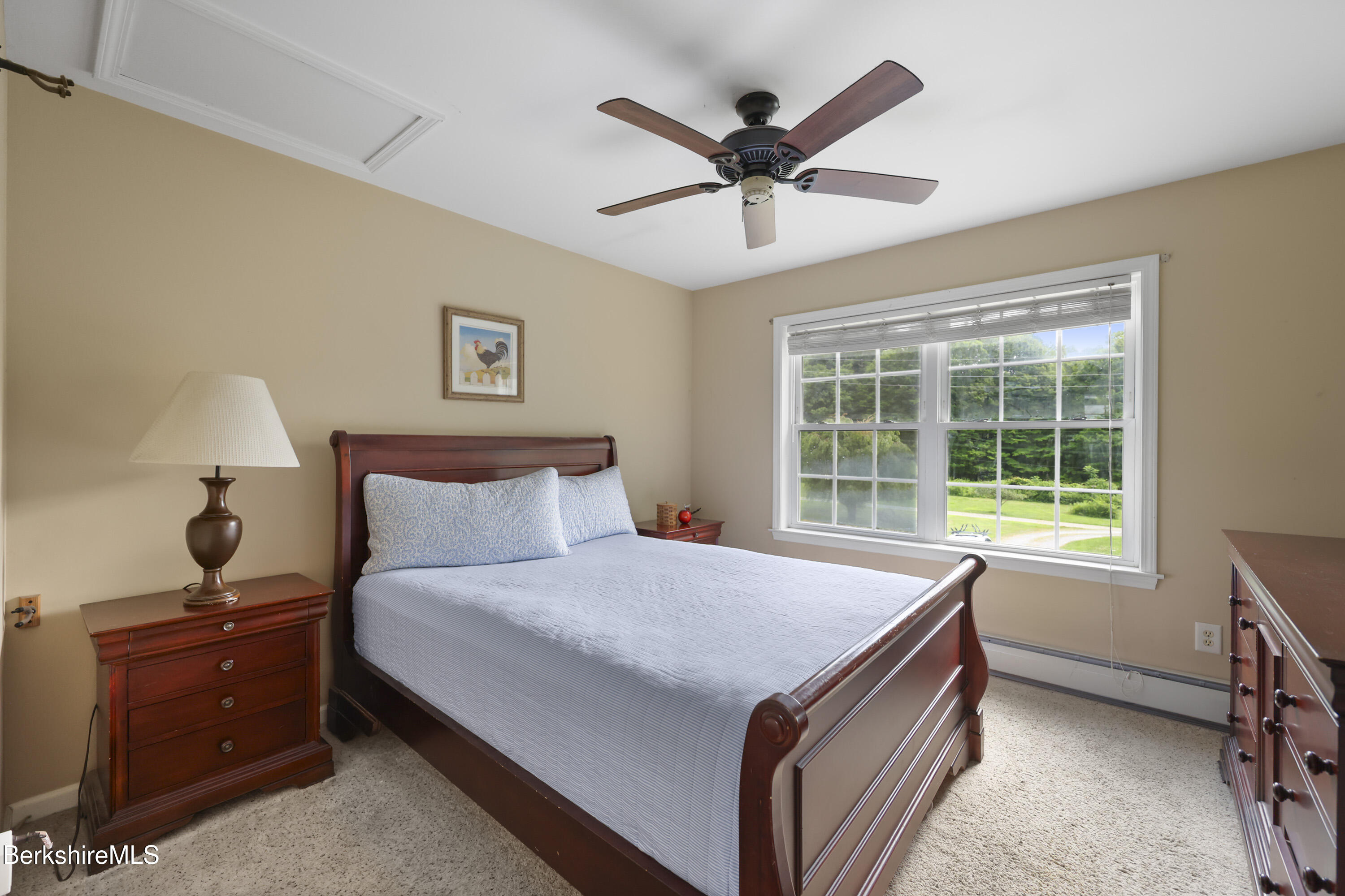 9 Castle Hill Road Stockbridge, MA 01262 - Photo 37 of 47 a bedroom with a large bed and a window