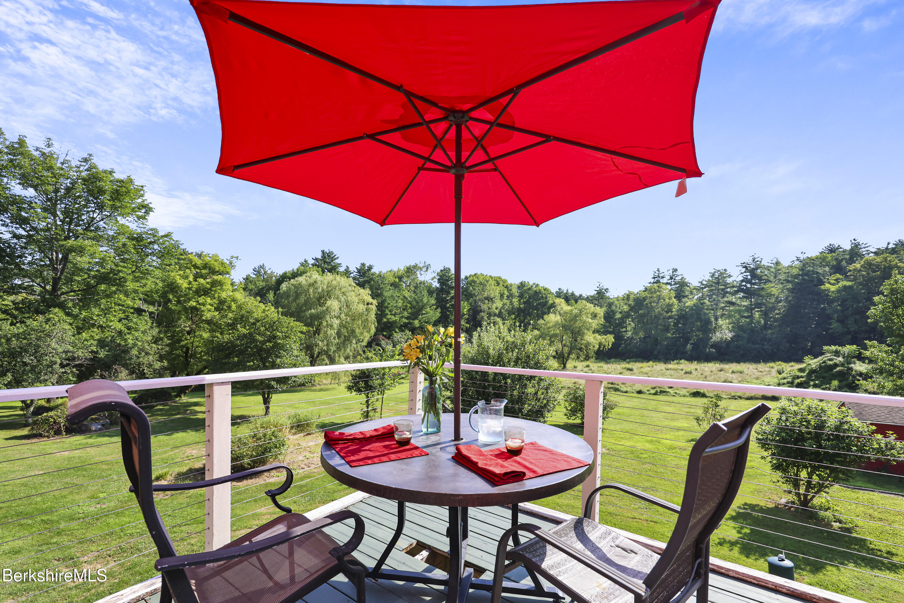 9 Castle Hill Road Stockbridge, MA 01262 - Photo 39 of 47 an outdoor space with furniture and umbrella