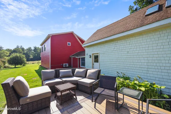 a outdoor living space with furniture and garden
