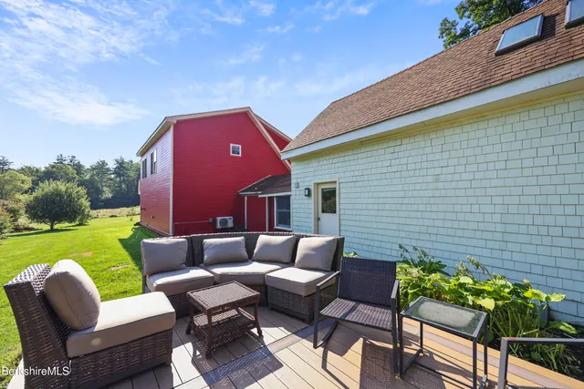 a outdoor living space with furniture and garden