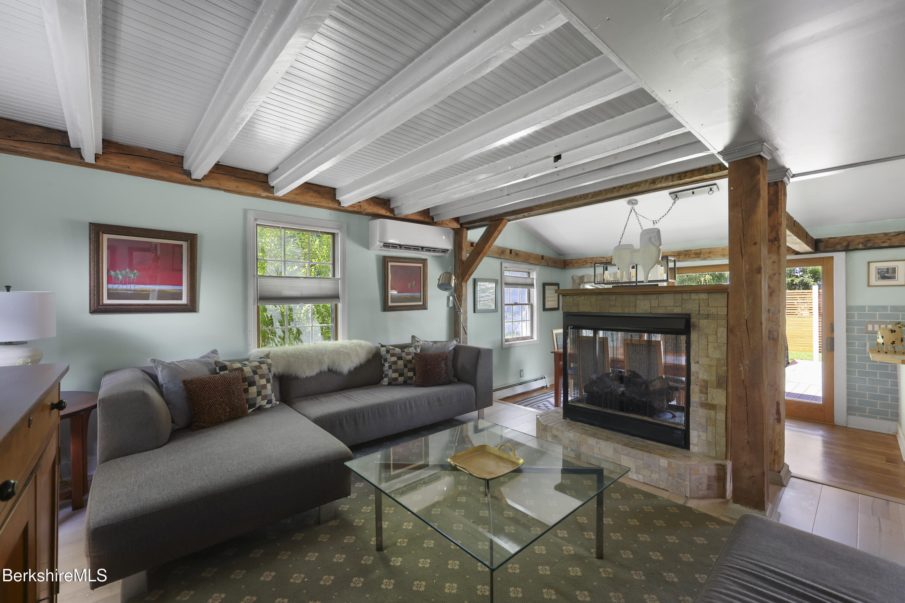 9 Castle Hill Road Stockbridge, MA 01262 - Photo 8 of 47 a living room with furniture and a fireplace