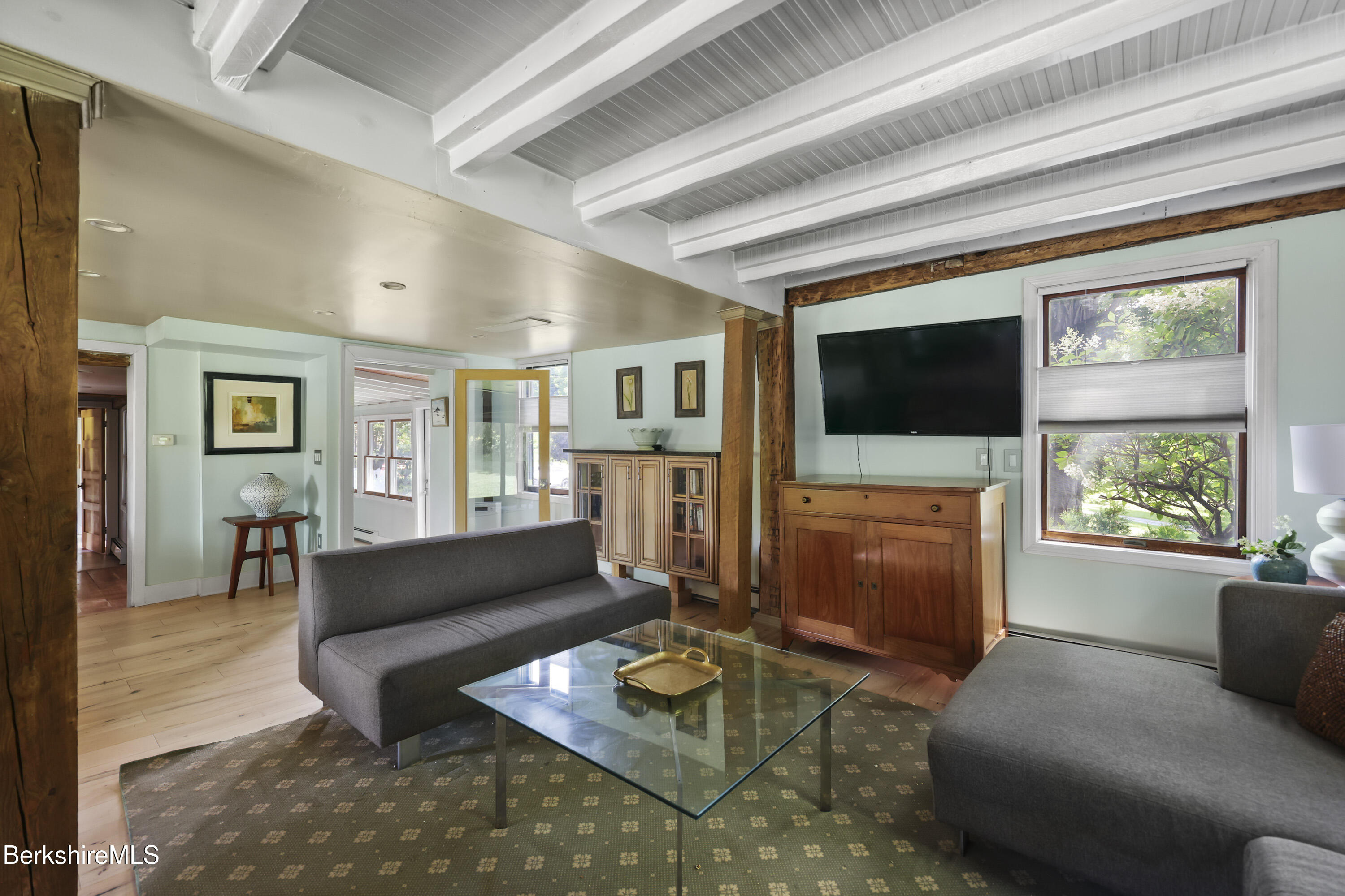 9 Castle Hill Road Stockbridge, MA 01262 - Photo 9 of 47 a living room with furniture and a flat screen tv