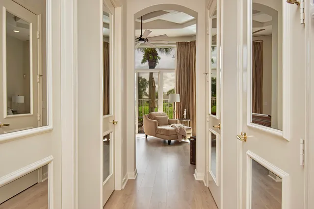 a view of a house with backyard porch and sitting area