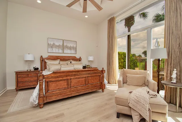 a view of a house with backyard porch and sitting area