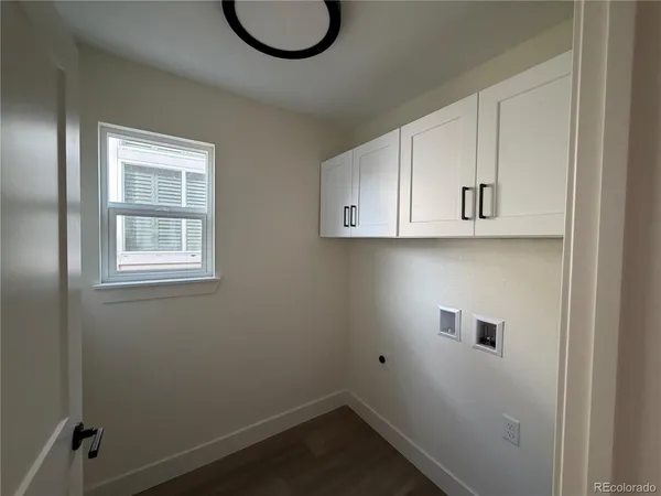 a bathroom with a sink and cabinets