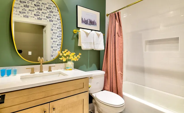 a room with furniture pool table and window