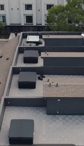 a view of living room with furniture and potted plant