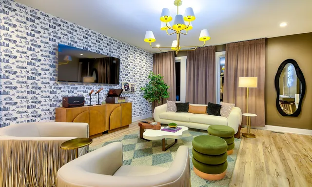 a living room with furniture and a flat screen tv