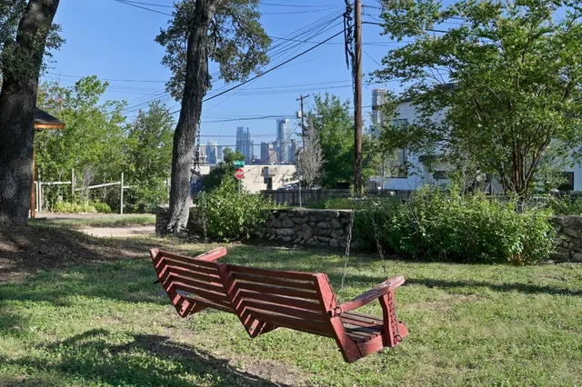 a garden view with a sitting space and garden