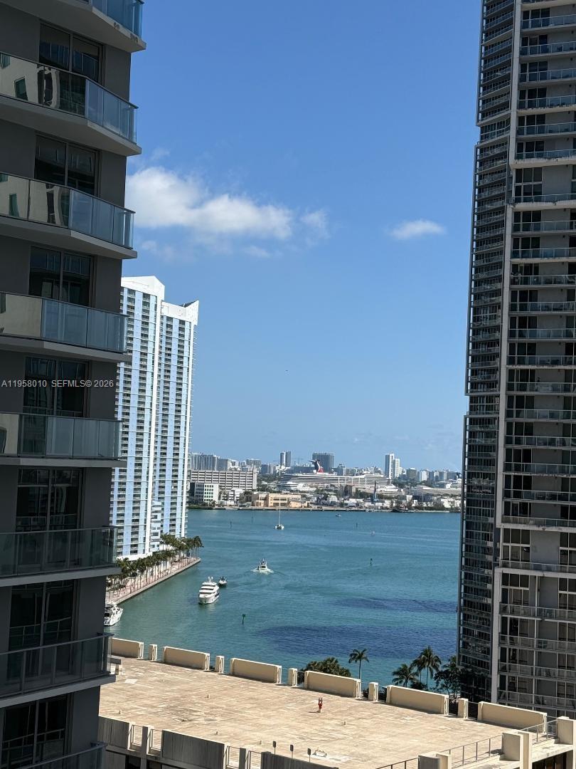55 Southeast 6th Street, Unit 1807 Miami, FL 33131 - Photo 17 of 23 a view of building with an outdoor space