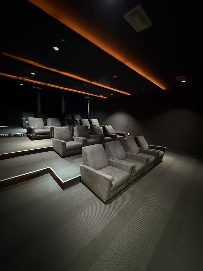 55 Southeast 6th Street, Unit 1807 Miami, FL 33131 - Photo 22 of 23 a living room with furniture