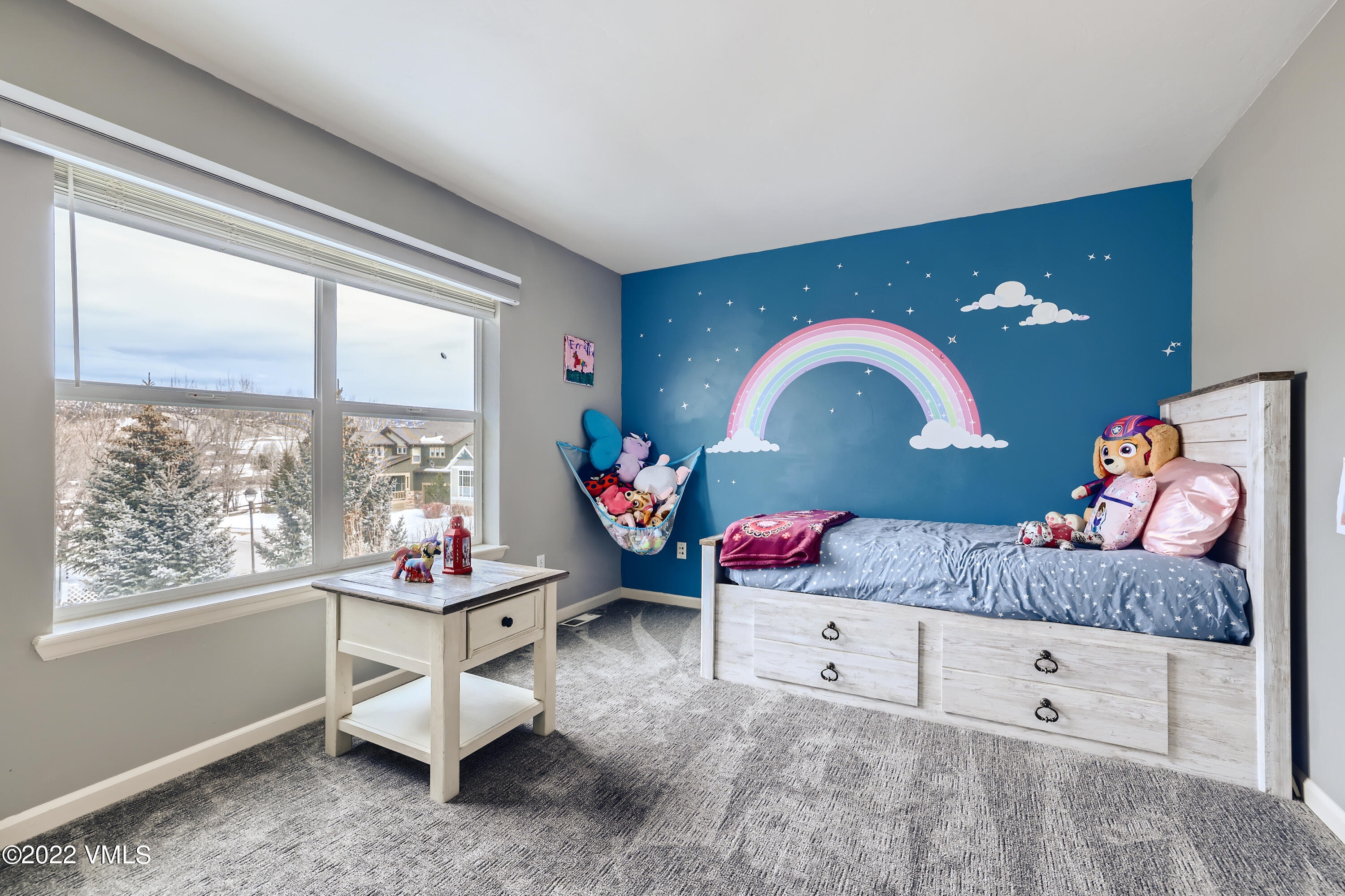 279 Longview Avenue Eagle, CO 81631 - Photo 15 of 30 a bedroom with a bed and a dresser