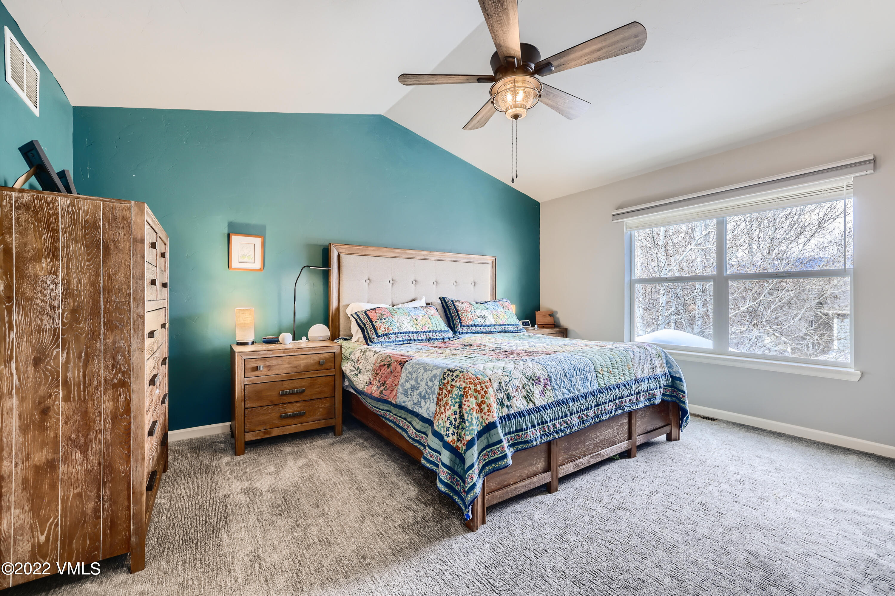 279 Longview Avenue Eagle, CO 81631 - Photo 17 of 30 a spacious bedroom with a bed dresser and a window