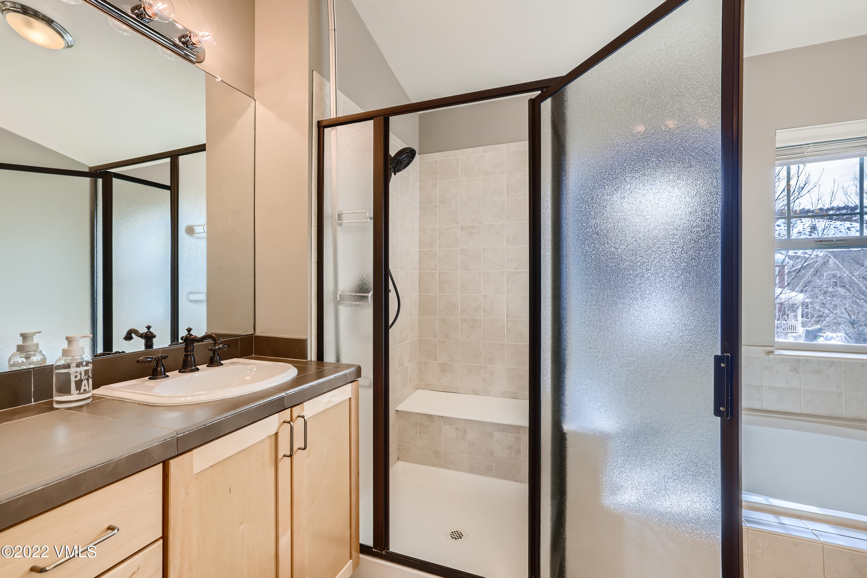 279 Longview Avenue Eagle, CO 81631 - Photo 19 of 30 a bathroom with a double vanity sink and mirror