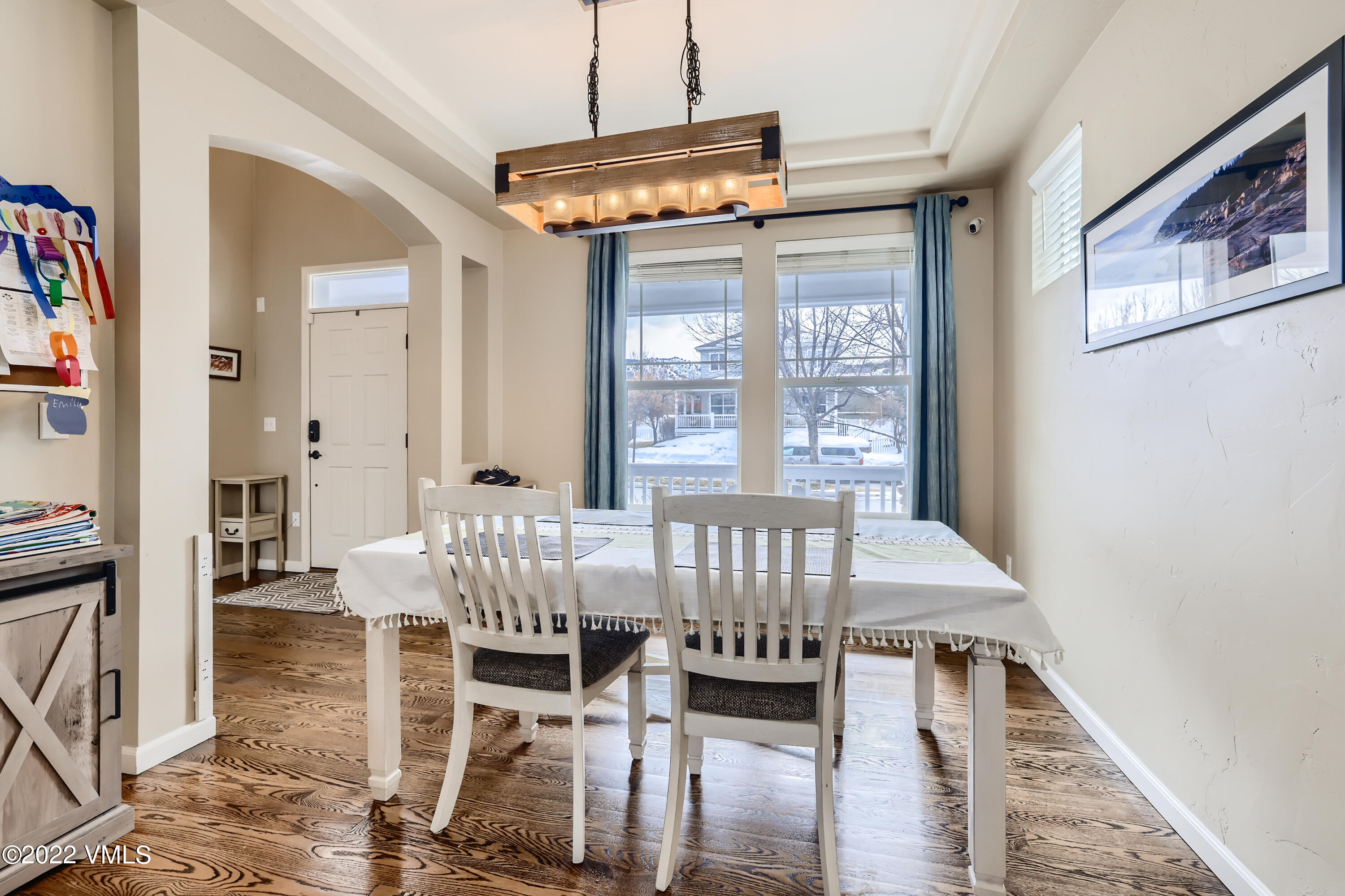 279 Longview Avenue Eagle, CO 81631 - Photo 5 of 30 a view of a dining room with furniture window and wooden floor